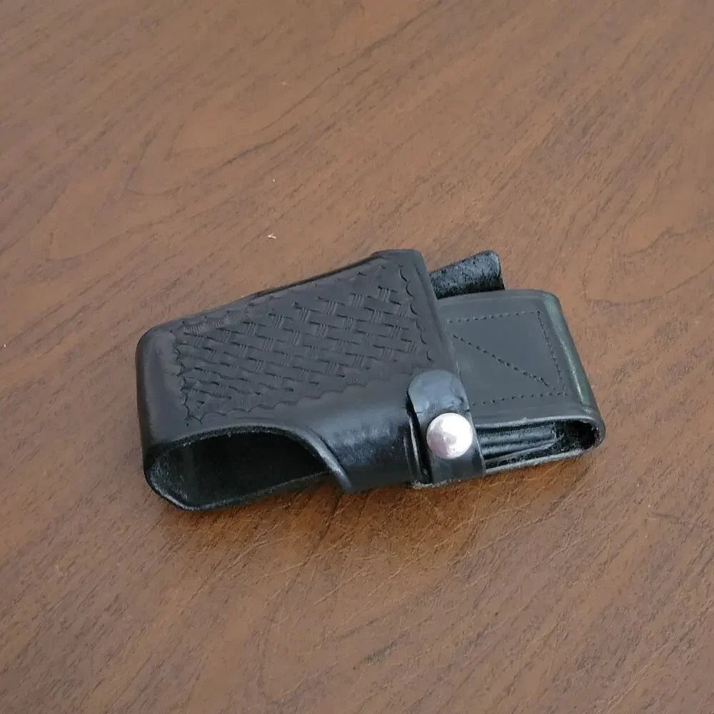 Triple K 890 Black Leather Radio Holster. Pre-owned, good shape.